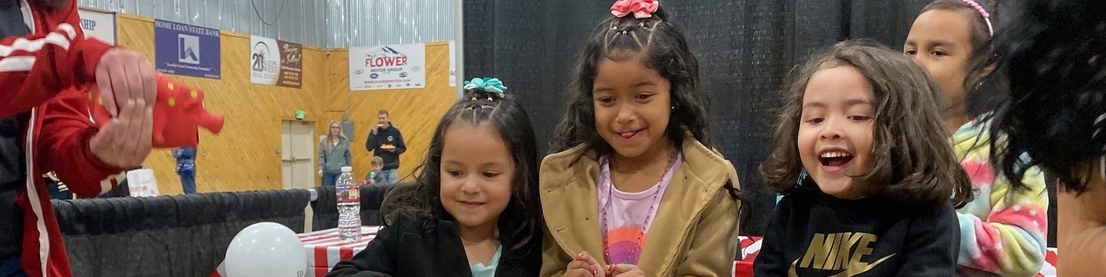 Preschool students smiling
