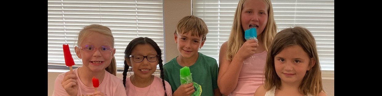 Oak Grove Elementary kids eating popsicles