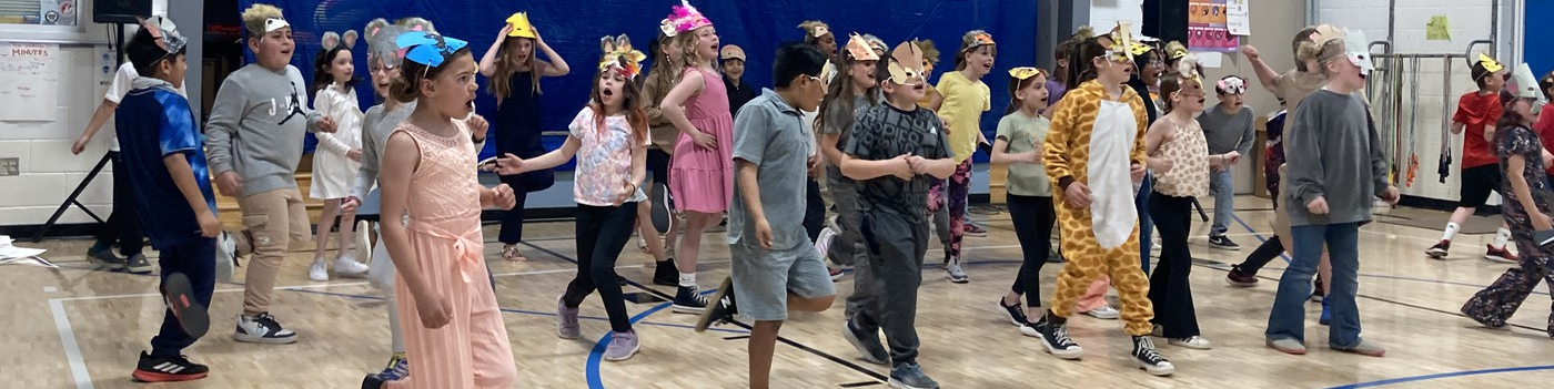 Pomona Elementary kids performing in costumes 